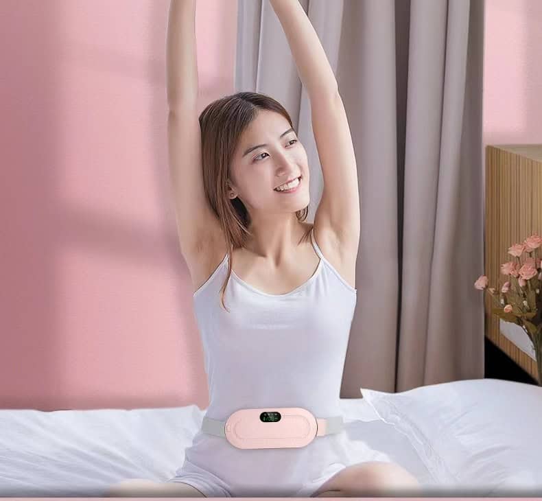 fc6d0219 1b5e 40dc 8dc9 791af0b72a33.jpg Woman stretching with warming belt